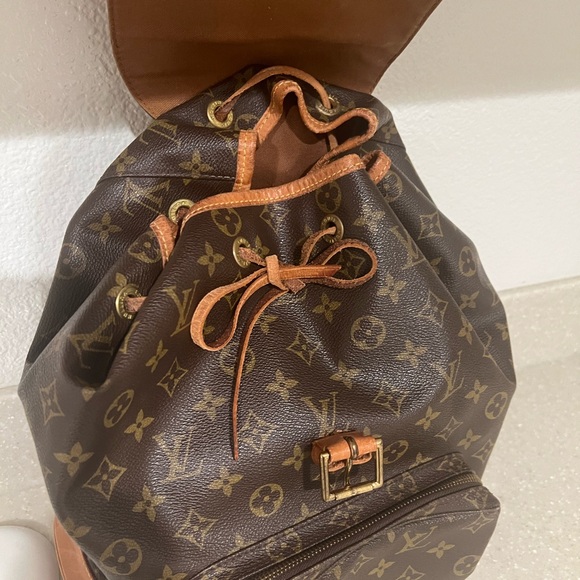 Authentic Louis Vuitton Brown Monogram Backpack - Picture 2 of 8